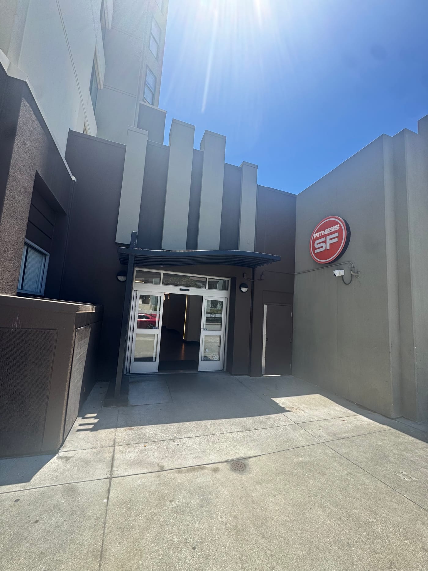 The building exterior with the SF Fitness sign