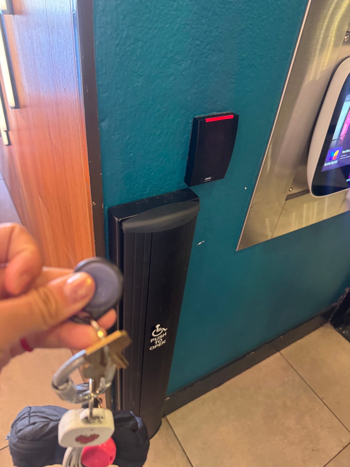 Holding the key fob up to the entry reader